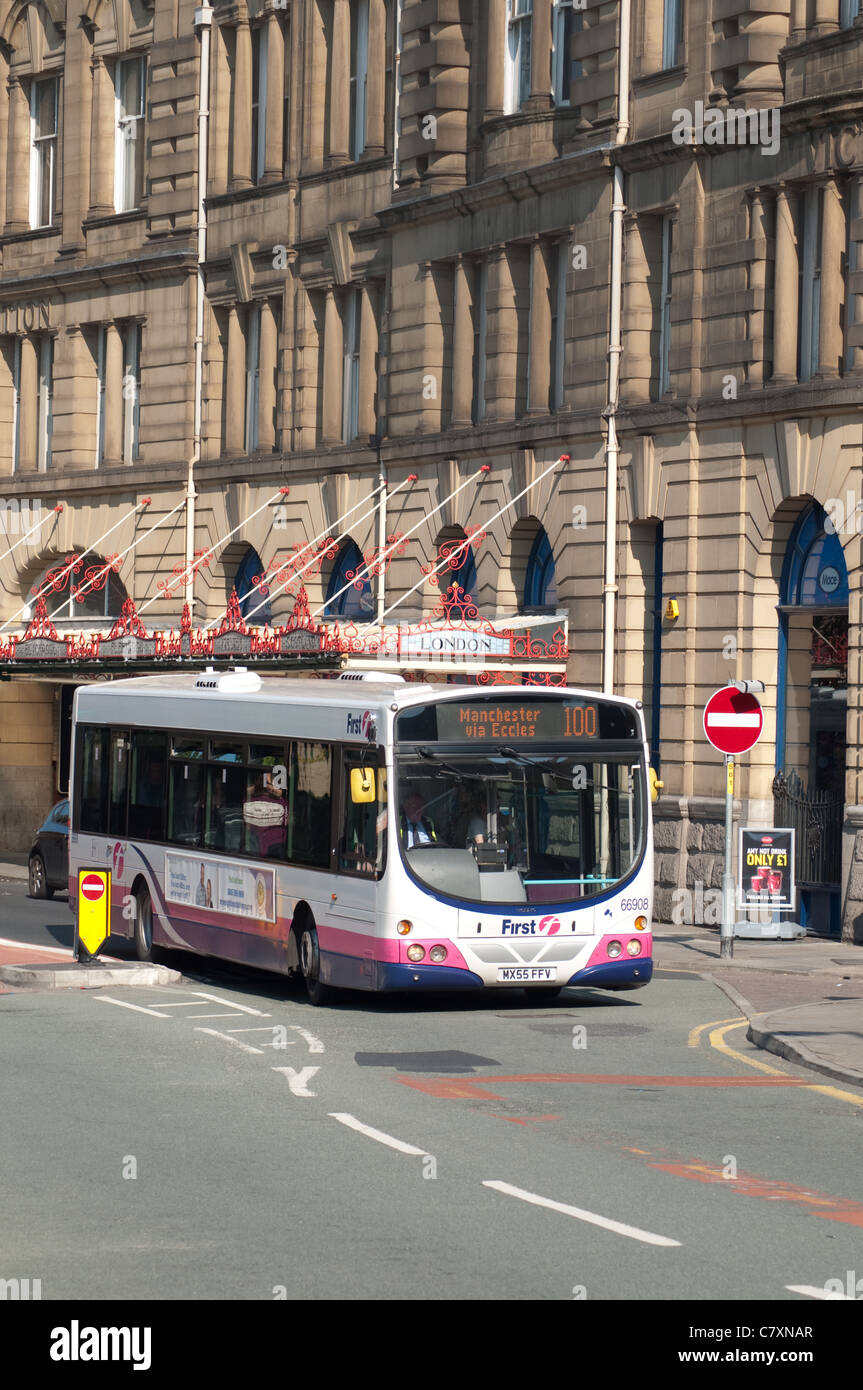 Single decker First bus in city centre Manchester. Stock Photo