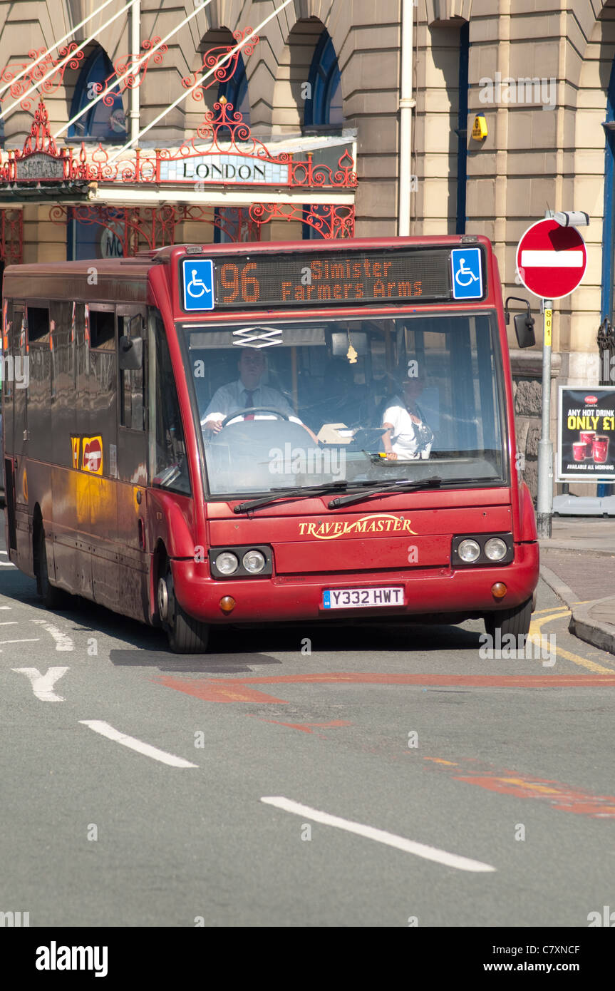Single decker bus in city centre Manchester. Stock Photo