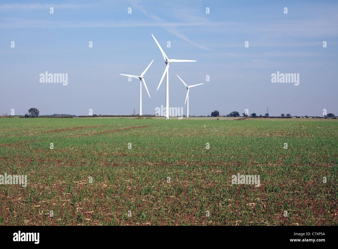 Wind turbines under a blue sky Stock Photo - Alamy