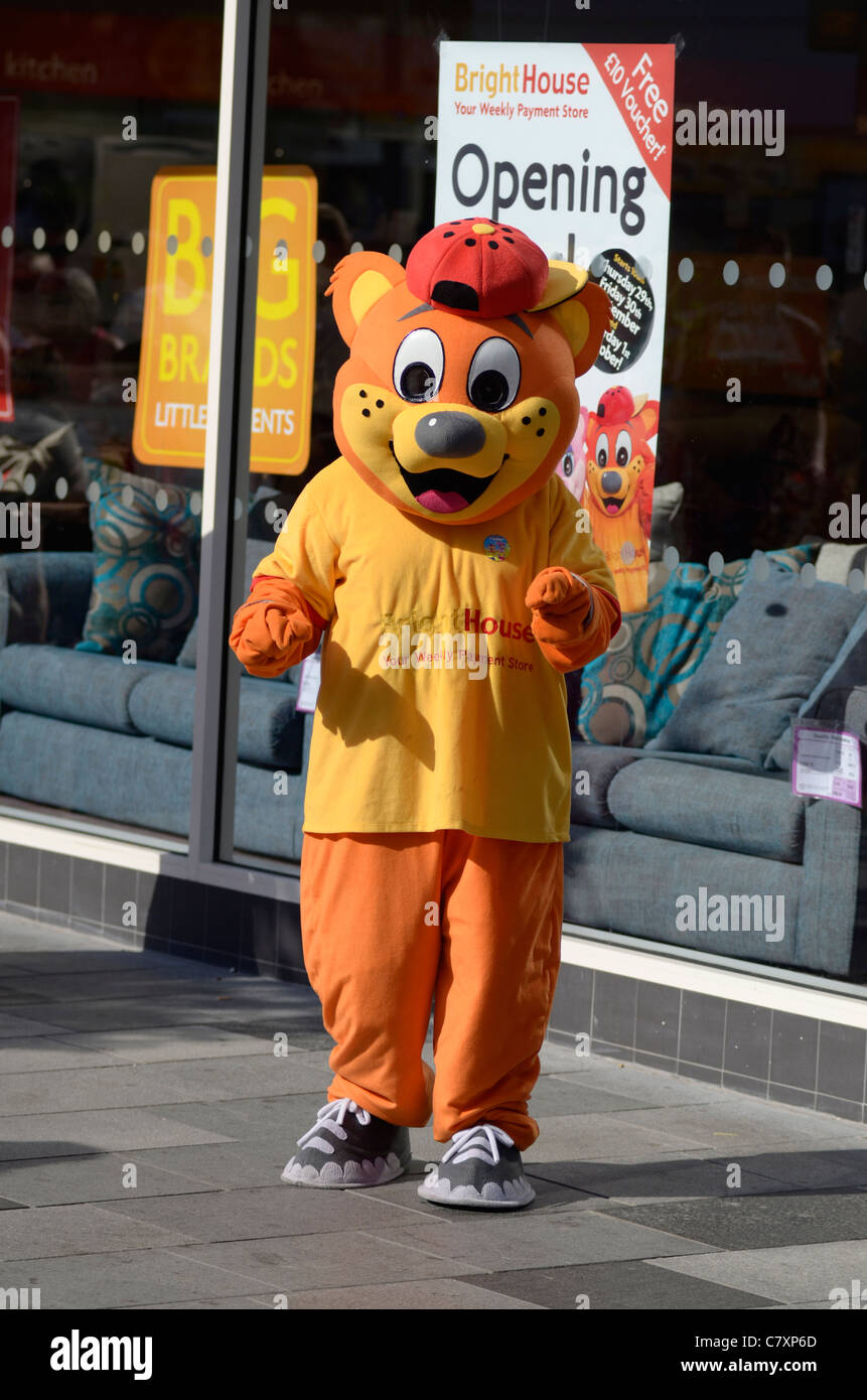 Promotion character outside Brighthouse furniture home store Plymouth Stock Photo