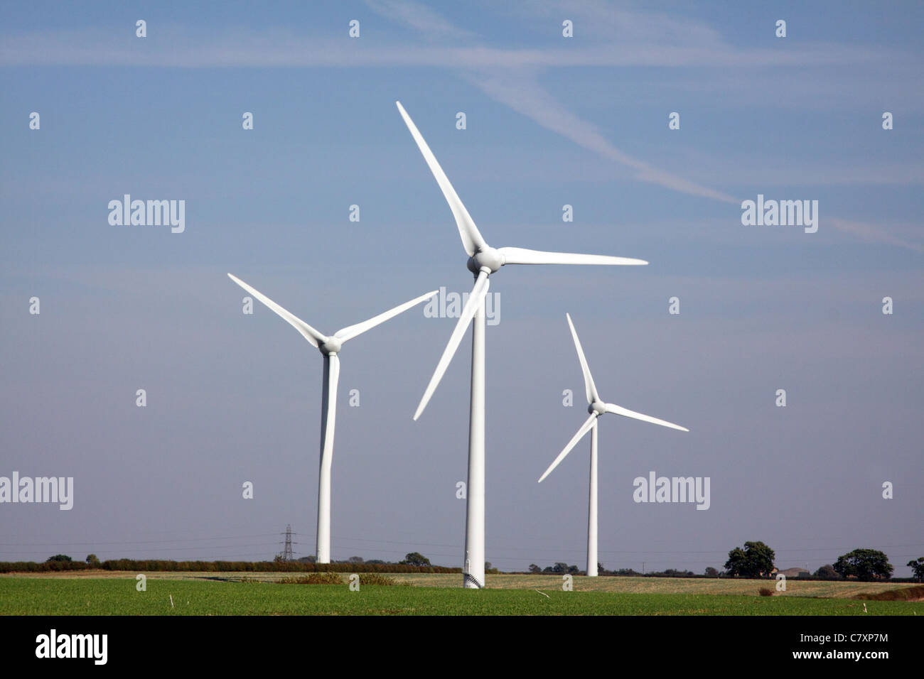 Wind turbines under a blue sky Stock Photo