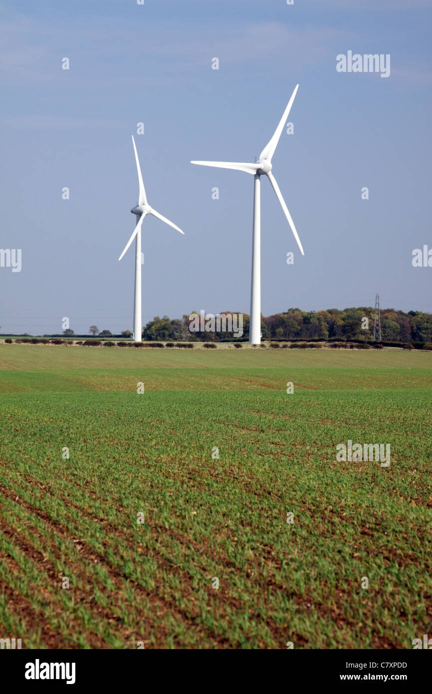Wind turbines under a blue sky Stock Photo - Alamy