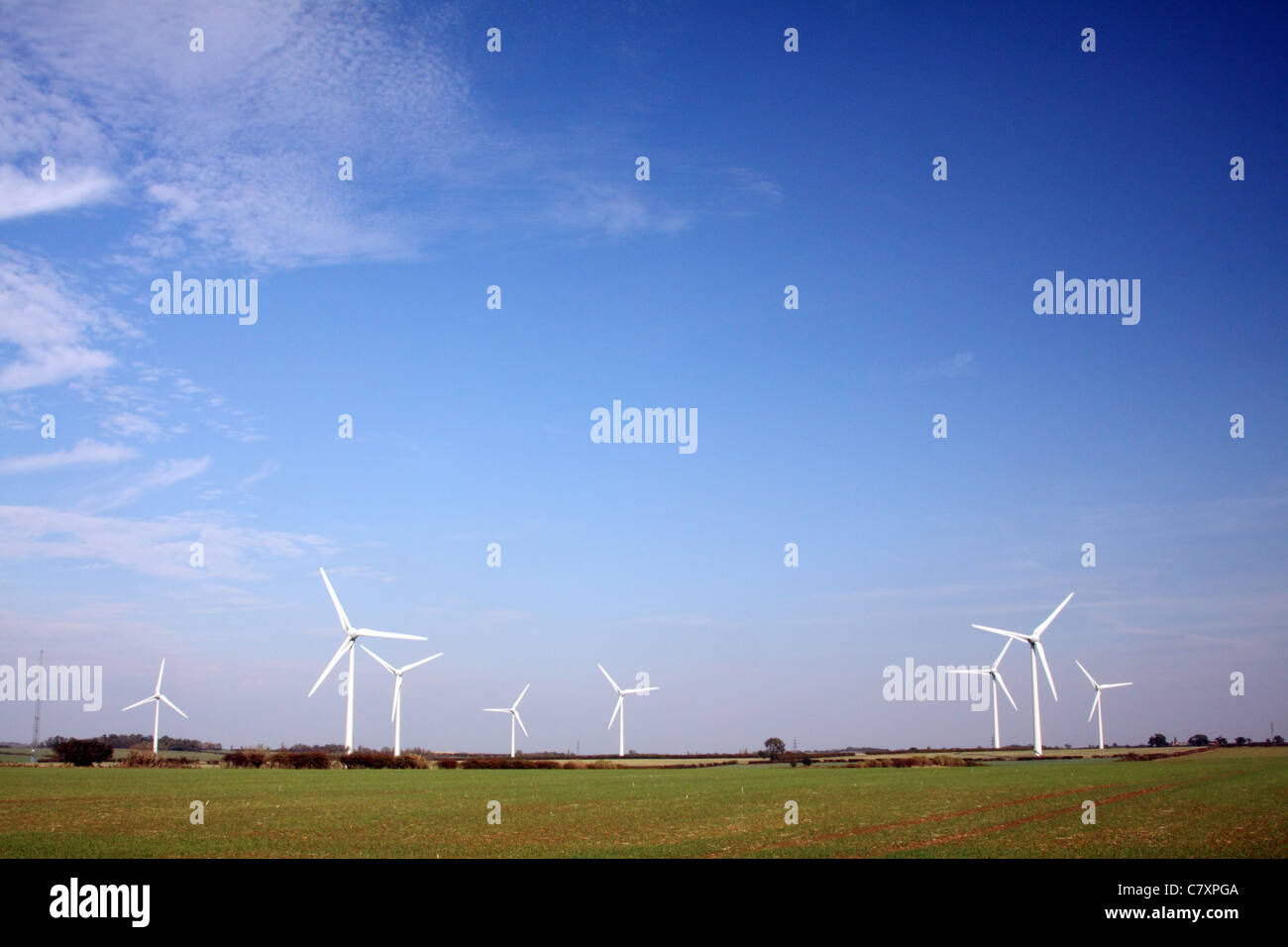 Wind turbines under a blue sky Stock Photo