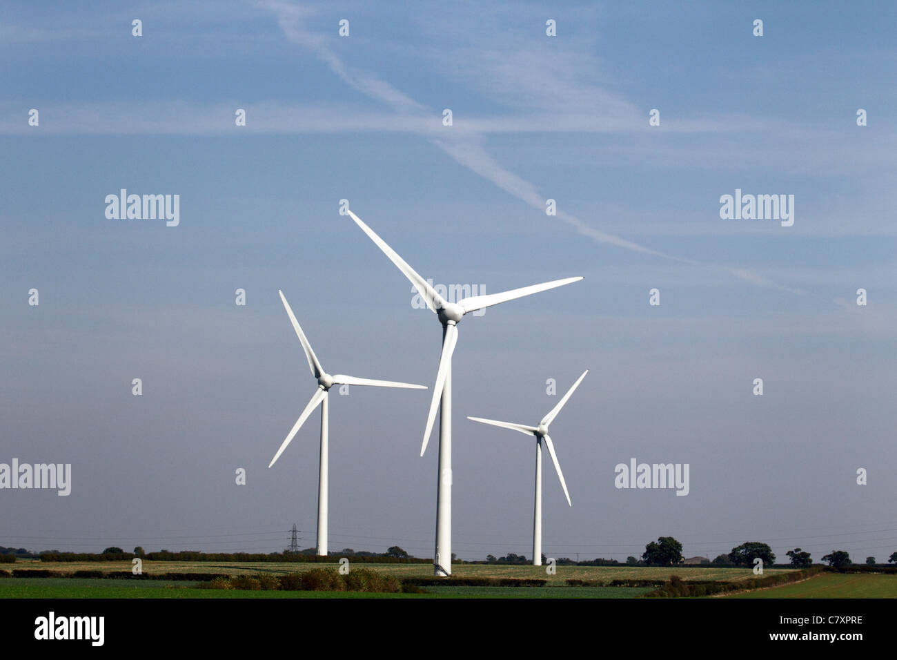 Wind turbines under a blue sky Stock Photo - Alamy