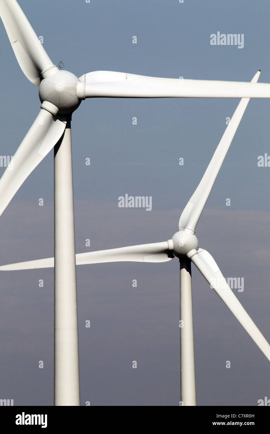 Wind turbines under a blue sky Stock Photo - Alamy