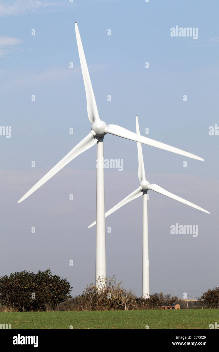 Wind turbines under a blue sky Stock Photo - Alamy