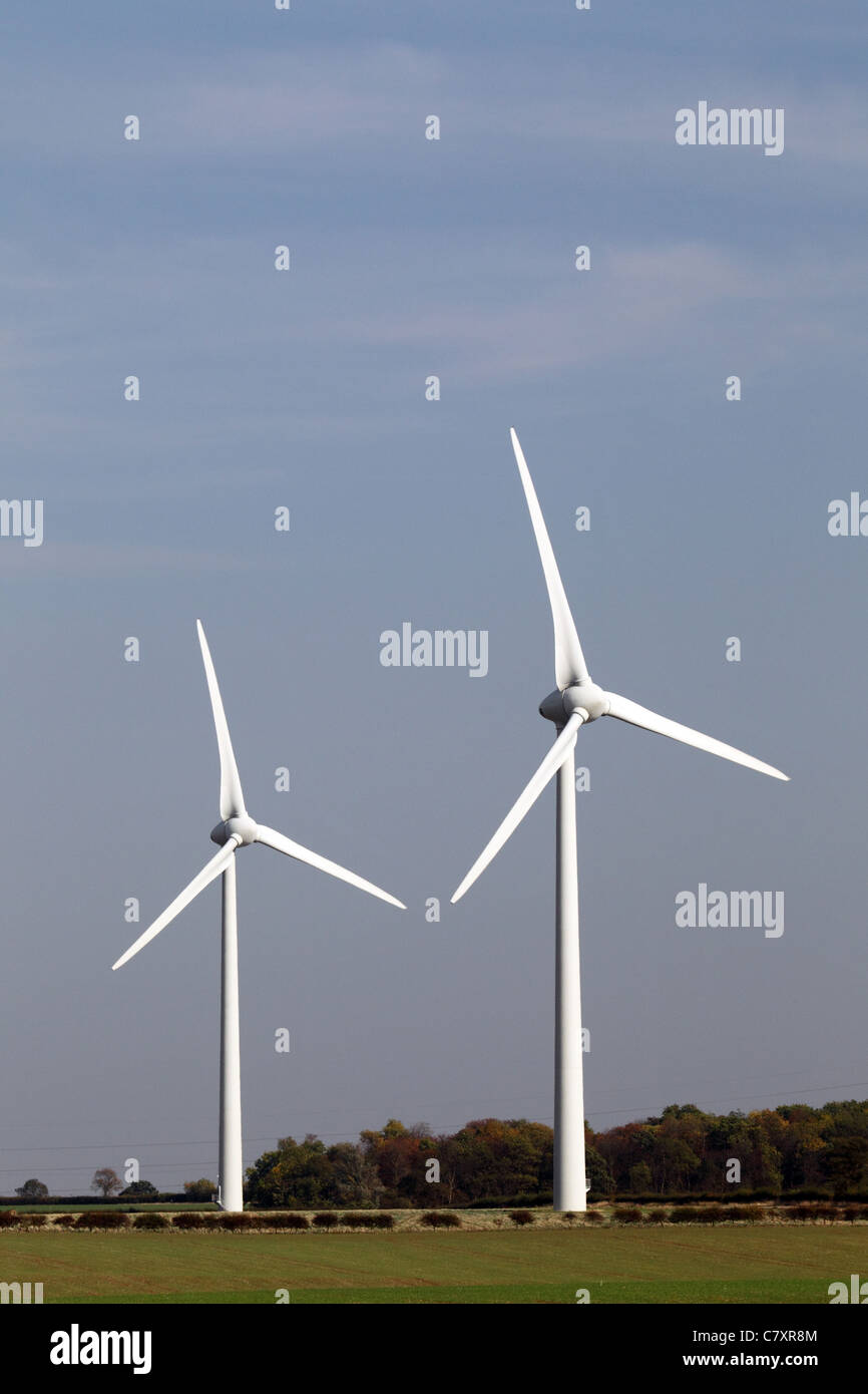 Wind turbines under a blue sky Stock Photo - Alamy