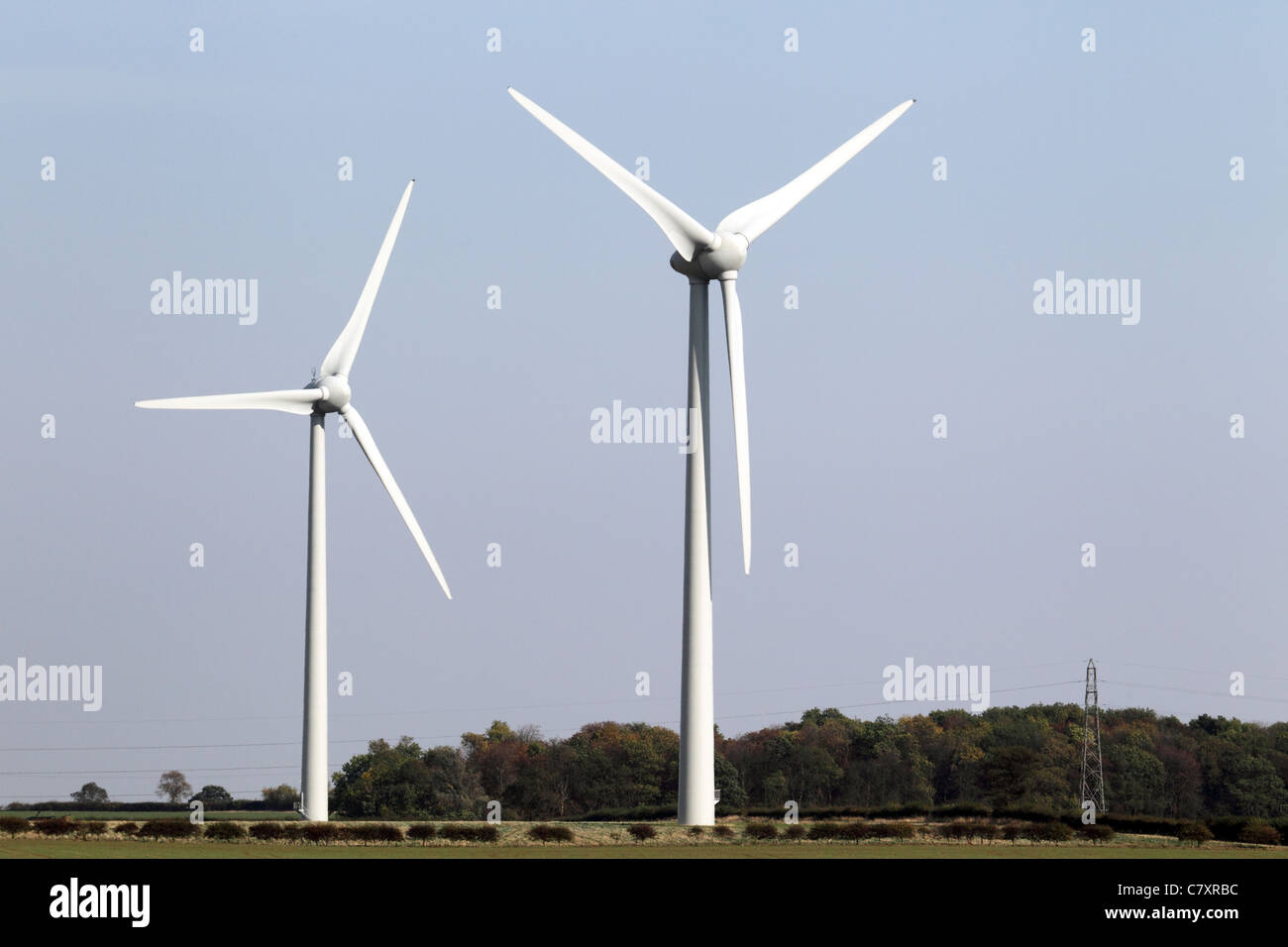 Wind turbines under a blue sky Stock Photo - Alamy
