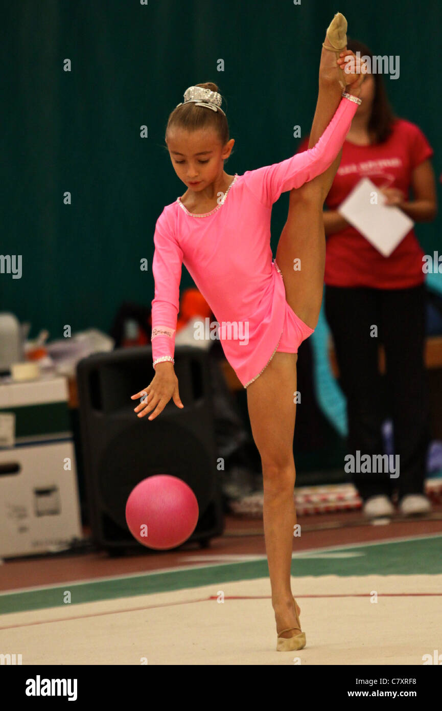 Young girl performing exercise with gymnastic ball Ferrara B Series