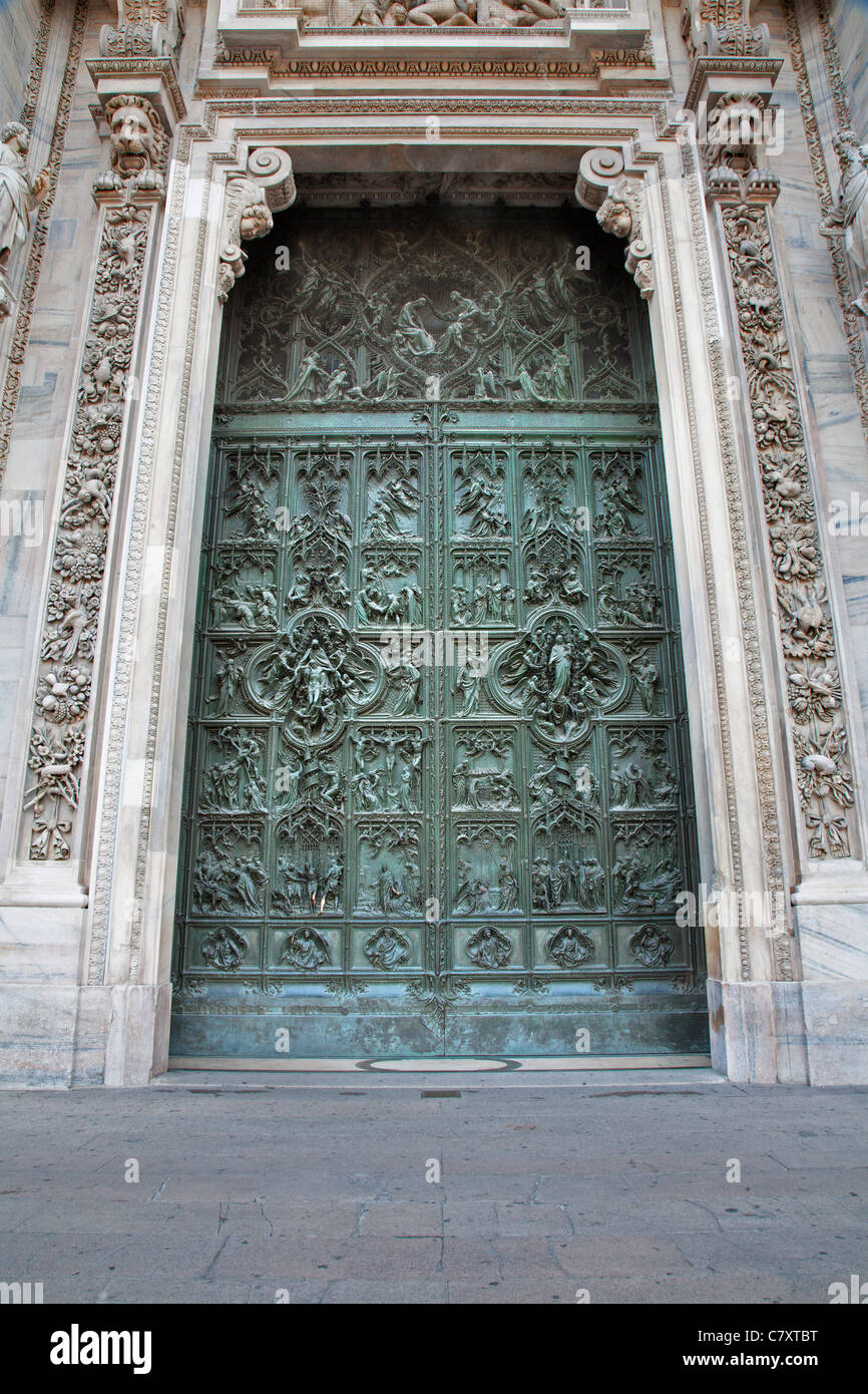 Milan -  main bronze gate - Porta maggiore del Duomo -  Lodovico Pogliaghi, 1906 Stock Photo