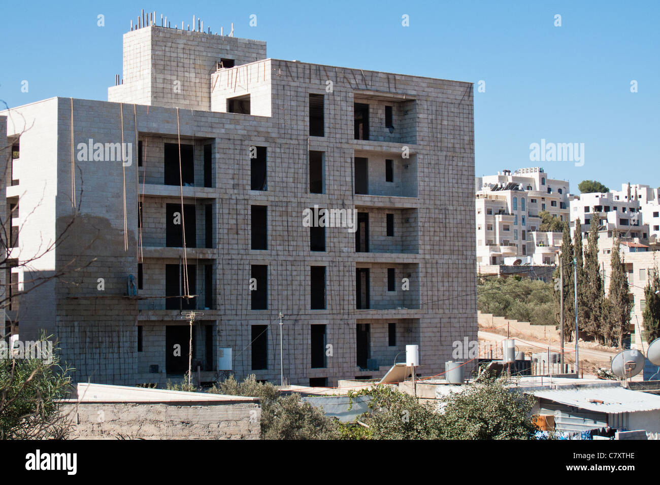 Apartment building under construction in the Arab neighborhood of Bet