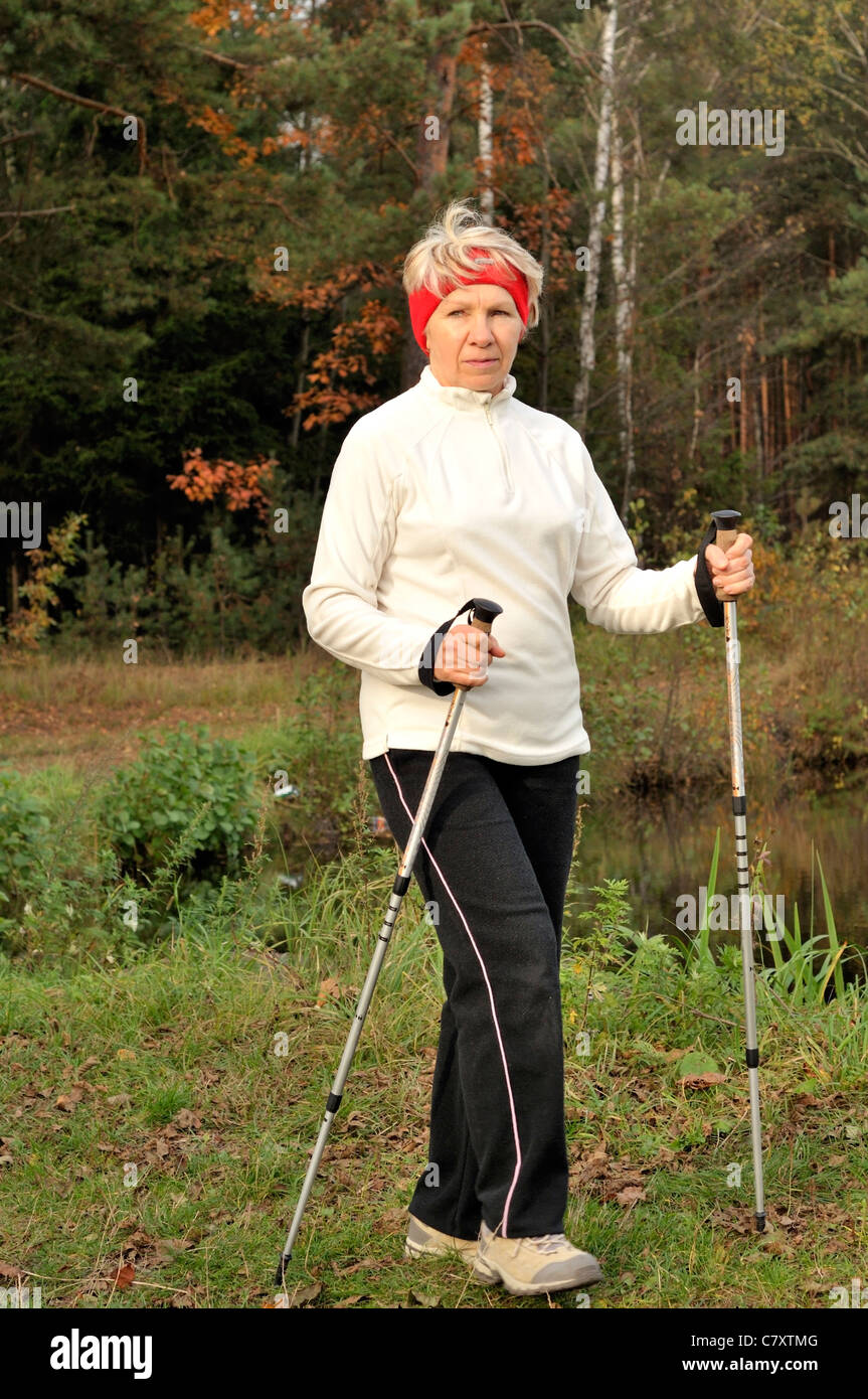 Mature woman nature walking sport hi-res stock photography and images ...