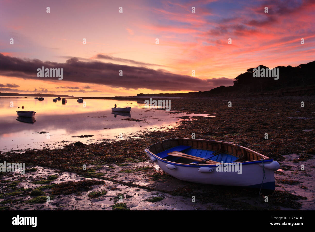 Pendrathen bay striking sunrise, St Marys Isles of Scilly. Stock Photo