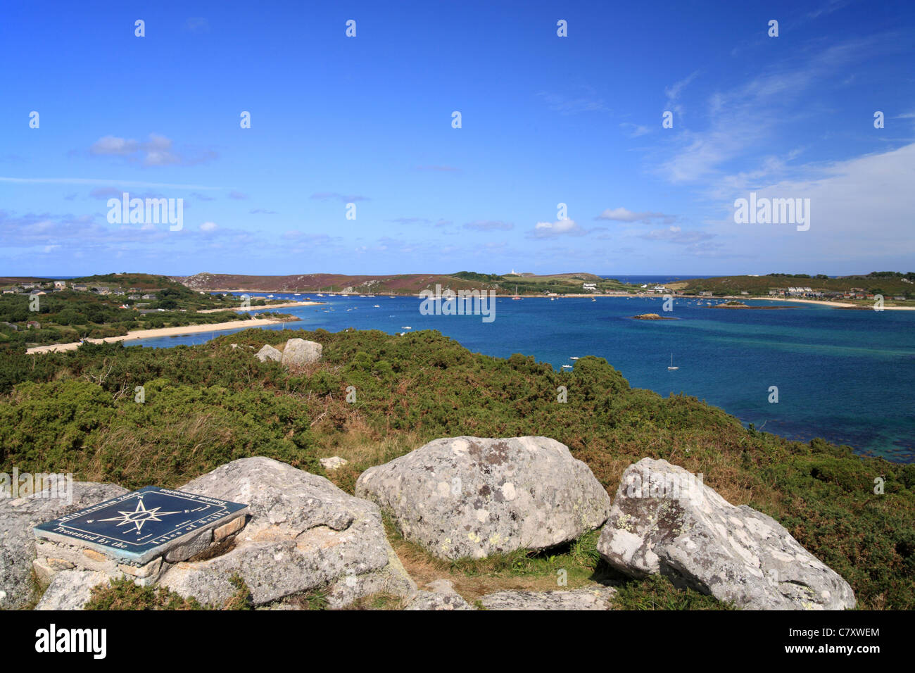 Samson Hill, Bryher, looking across the turquoise sea towards Tresco, Isles of Scilly, Cornwall. Stock Photo