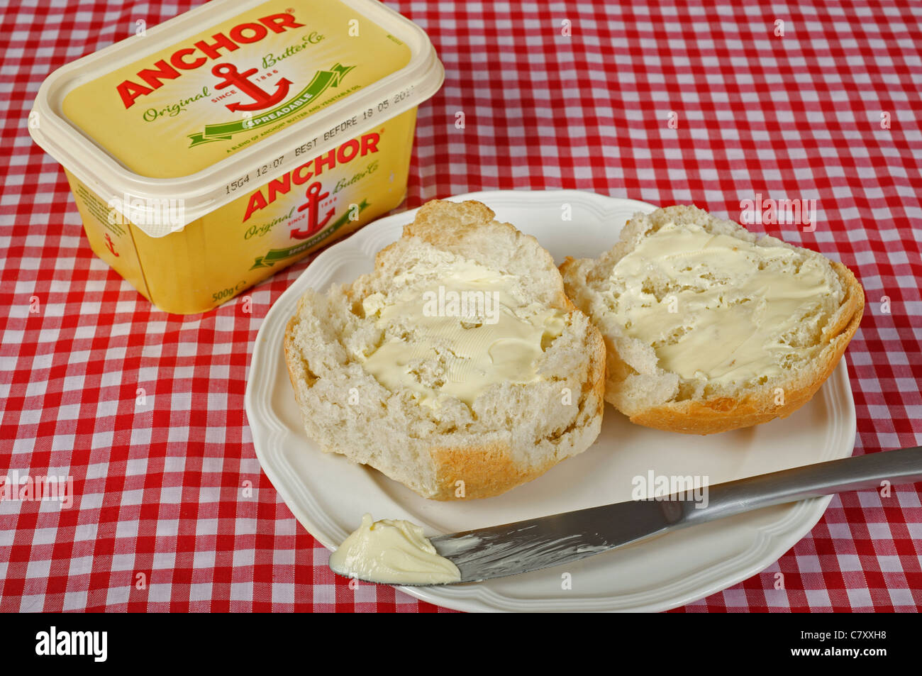 Anchor butter on bread roll Stock Photo Alamy