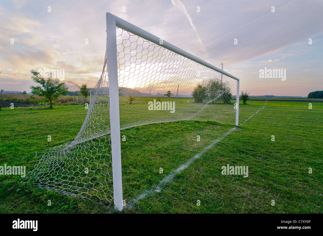 Goal shot from the corner in the front with the sunset Stock Photo