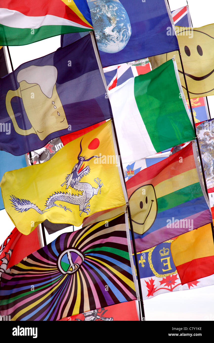 Variety of flags flying in breeze Stock Photo Alamy