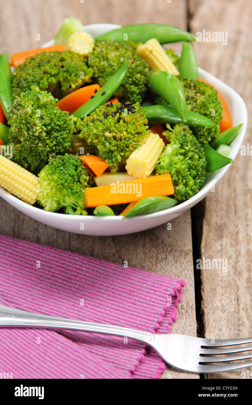 Broccoli salad with carrot ,baby corn and snap pea Stock Photo Alamy