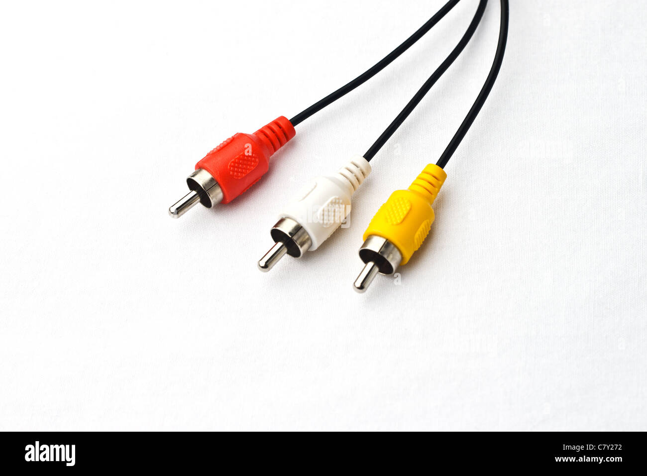 3 color av cable hanging down on faded white background Stock Photo
