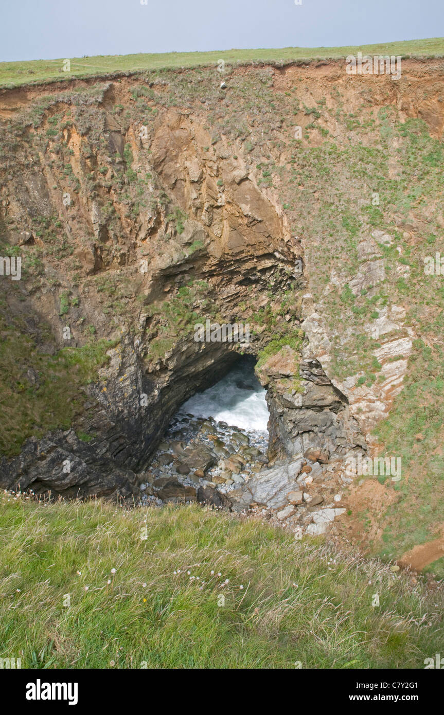 The Round Hole, a collapsed sea cave close to the coast path near Trevone in north Cornwall. Stock Photo
