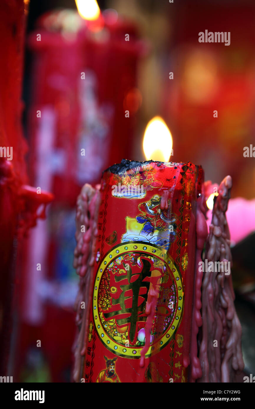 Candles burning at Hungry Ghost Festival in Stock Photo Alamy