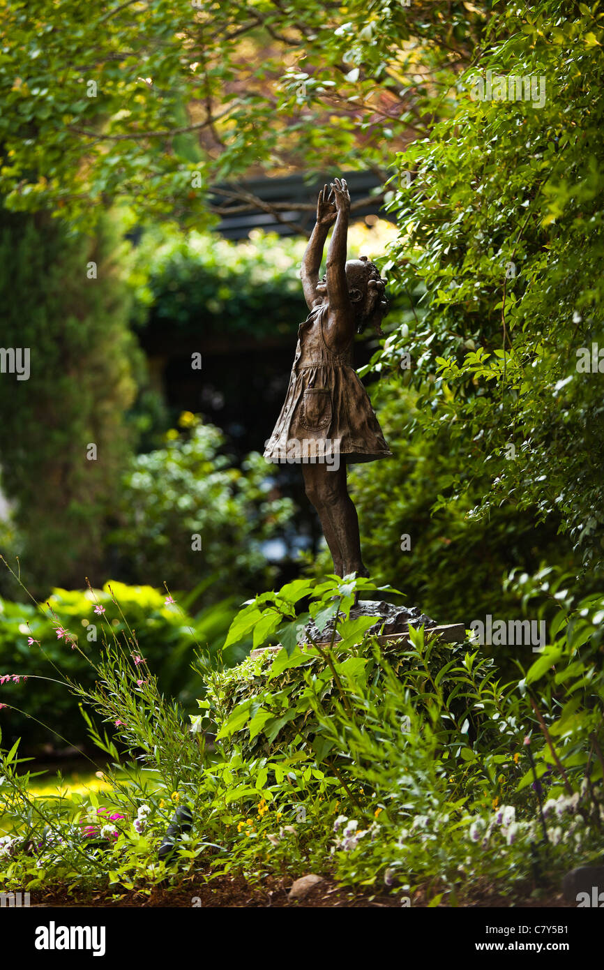 Statue in a private walled garden Charleston, SC Stock Photo Alamy