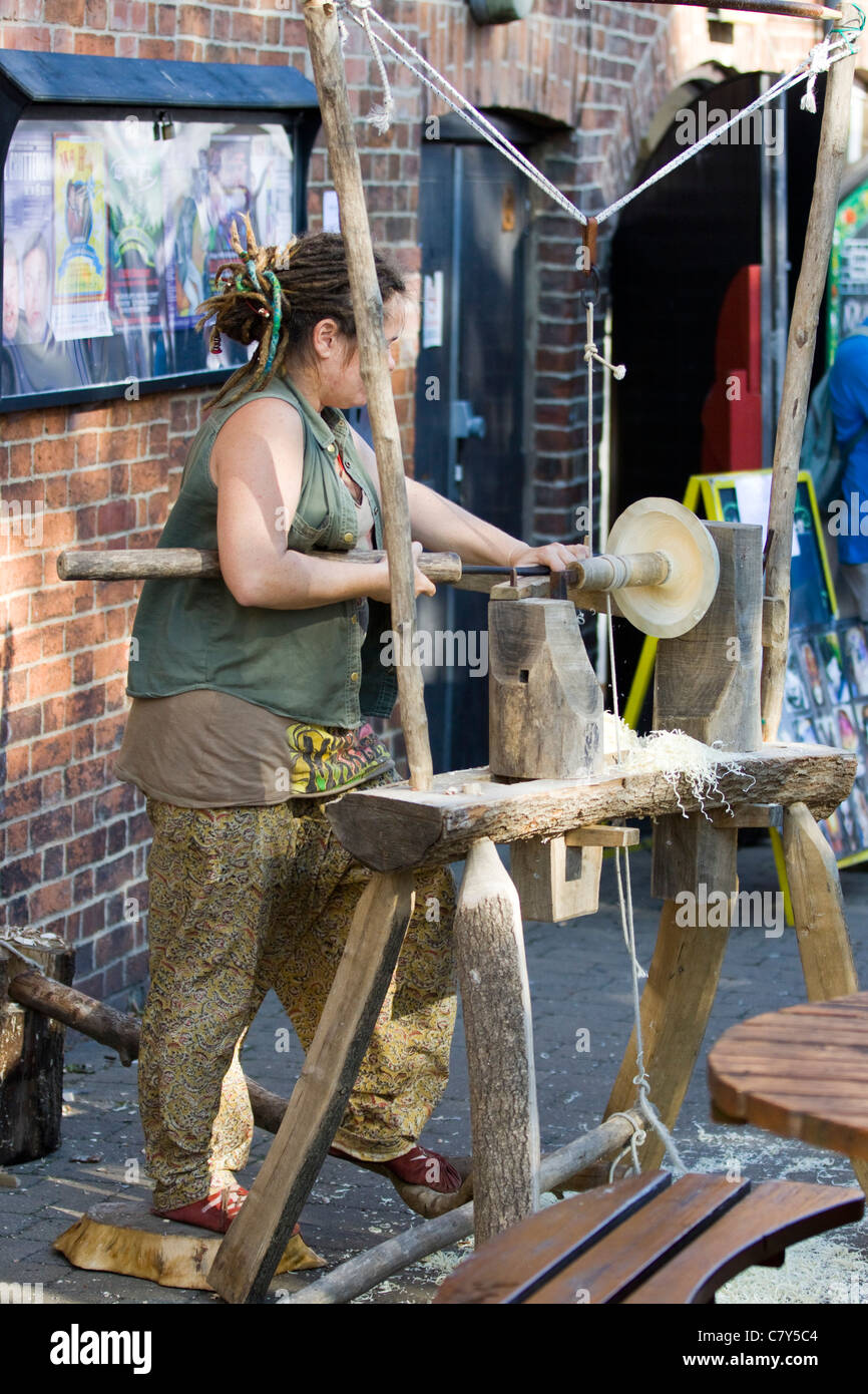 A Girl working a wood Lathe at a demonstration of wood in Banbury
