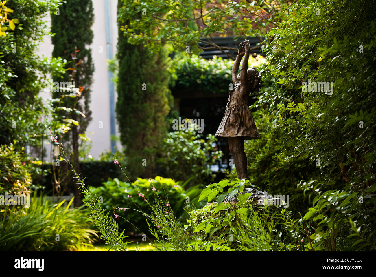 Statue in a private walled garden Charleston, SC Stock Photo Alamy
