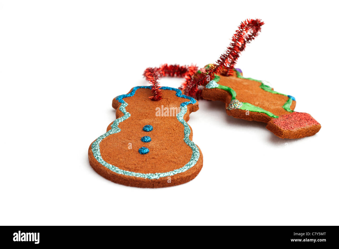 Two homemade gingerbread cookies against white background Stock Photo