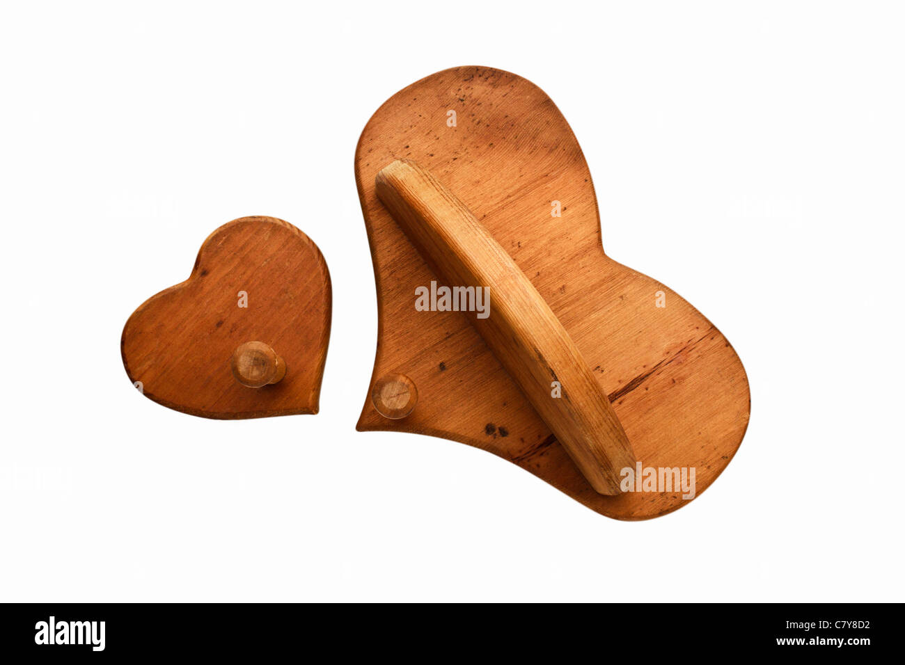 Two wooden heart shelves isolated against background Stock Photo