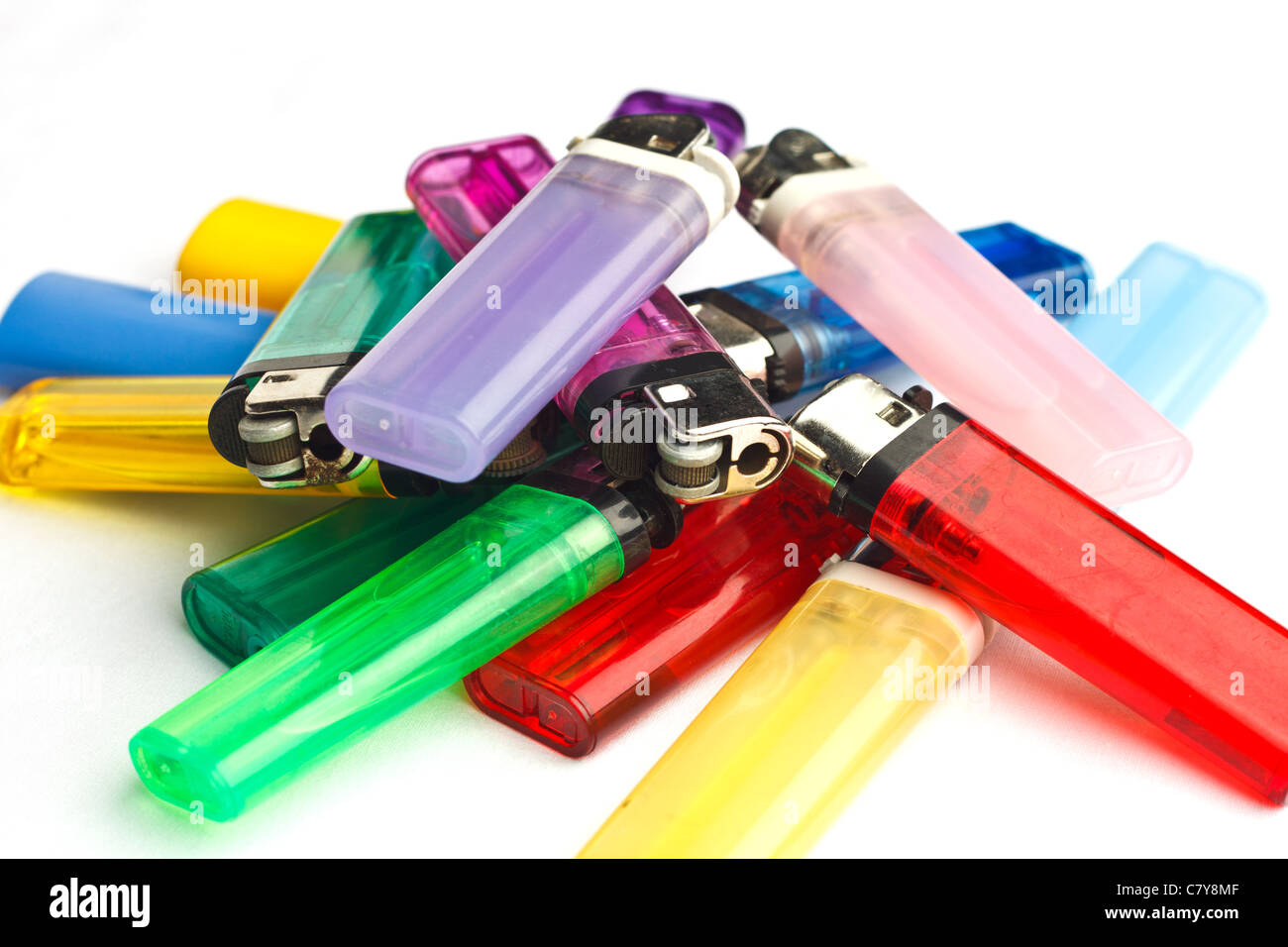 Pile of lighters in a variety of colors Stock Photo