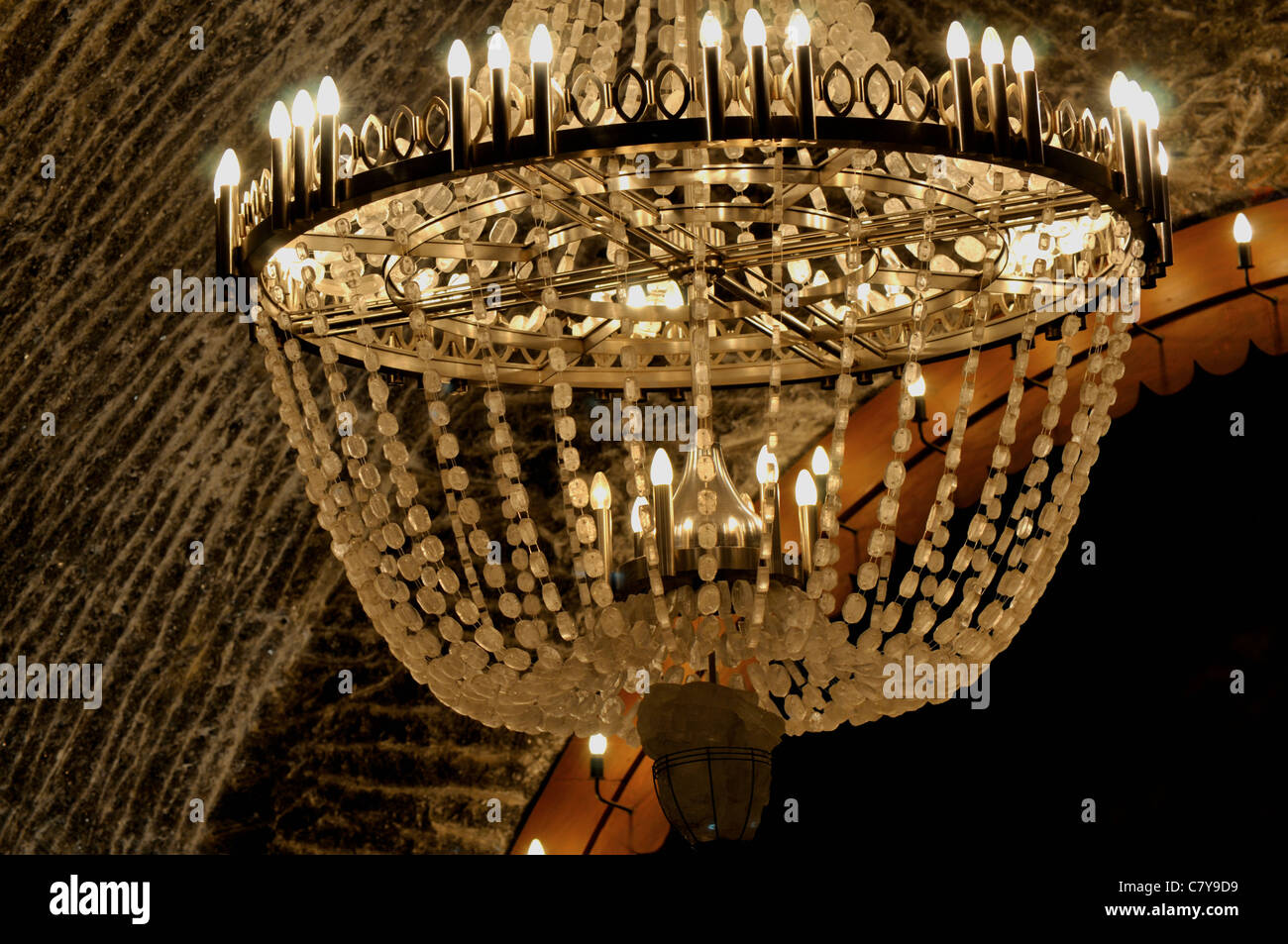 Chandelier made out of salt crystals in underground chamber of old salt  mine at Wieliczka Stock Photo - Alamy