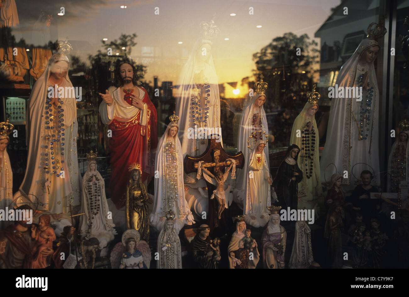 Portugal, Fatima, religious statues in window shop Stock Photo