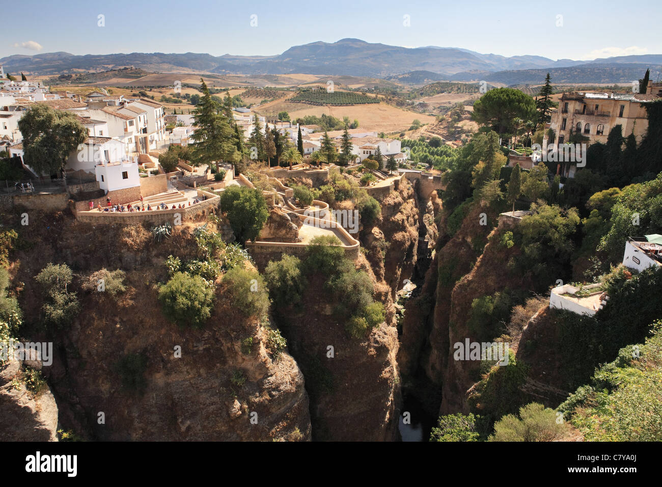 View of the gorge of El Tajo with the old or Arab bridge in the background, Ronda, Andalusia, Spain Stock Photo