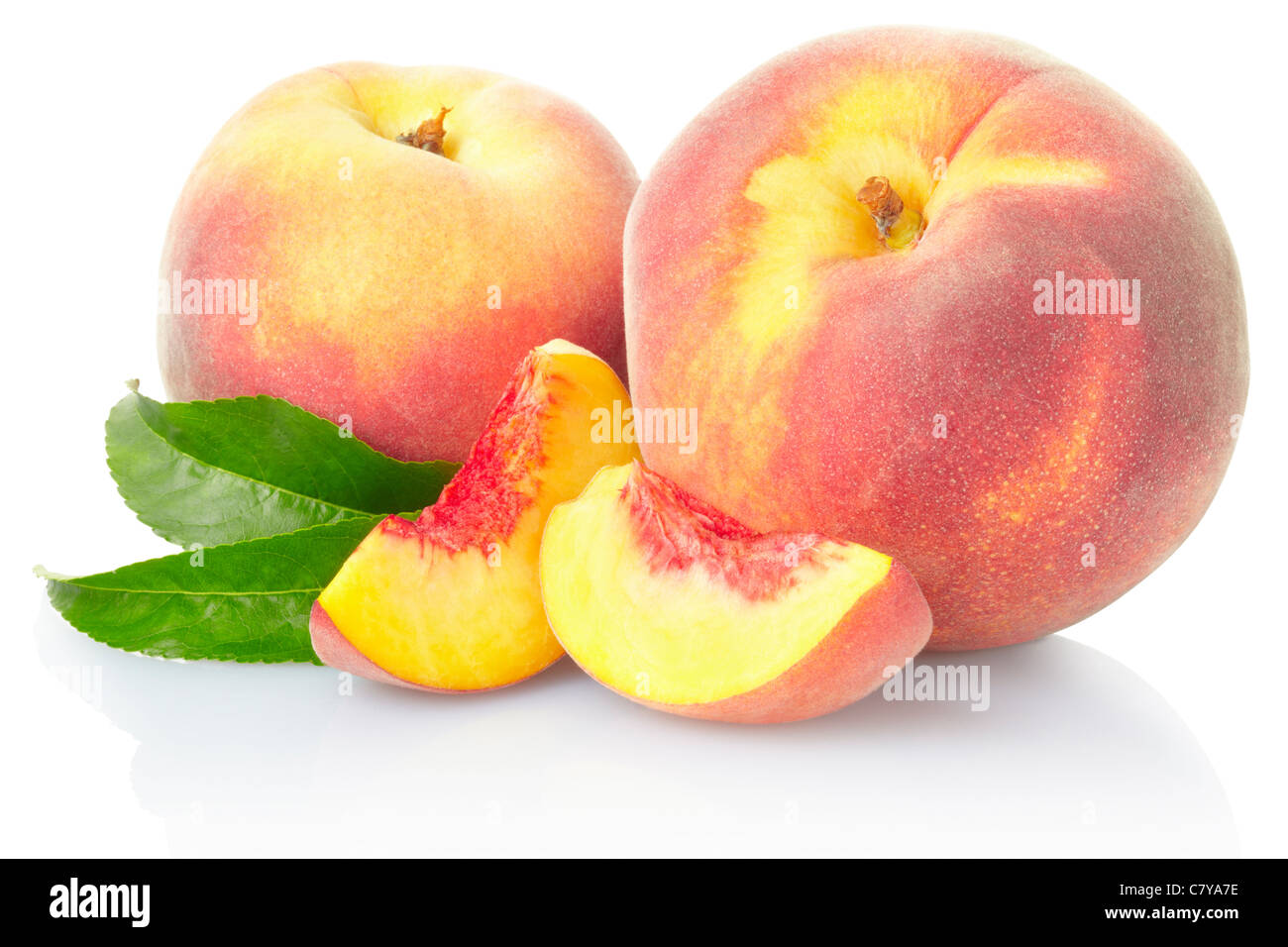 Peach fruit with leaves Stock Photo
