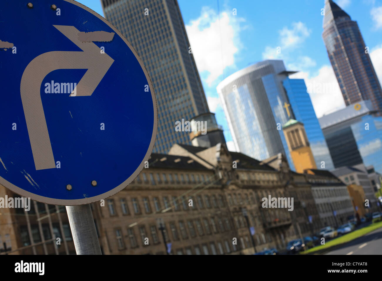 Turn right sign with the Trade centre tower in the background (far right). Stock Photo