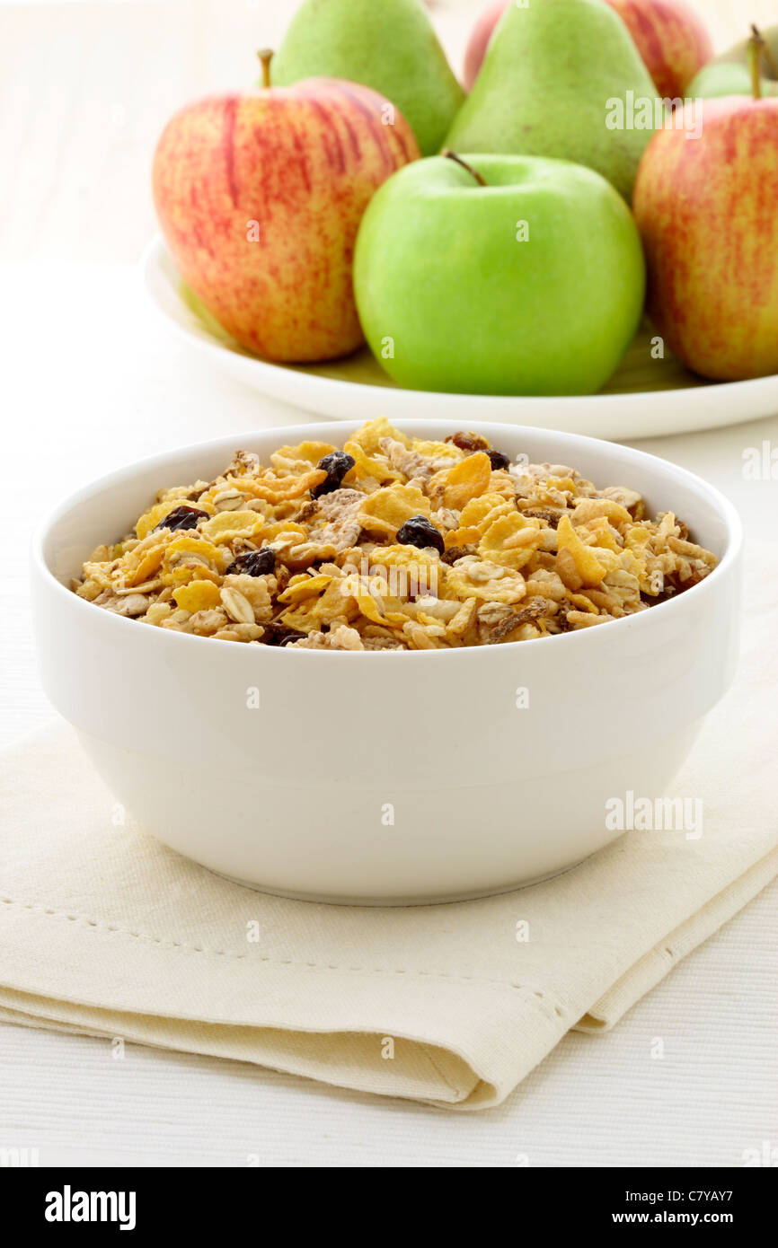delicious and healthy granola or muesli with fresh organic apples and