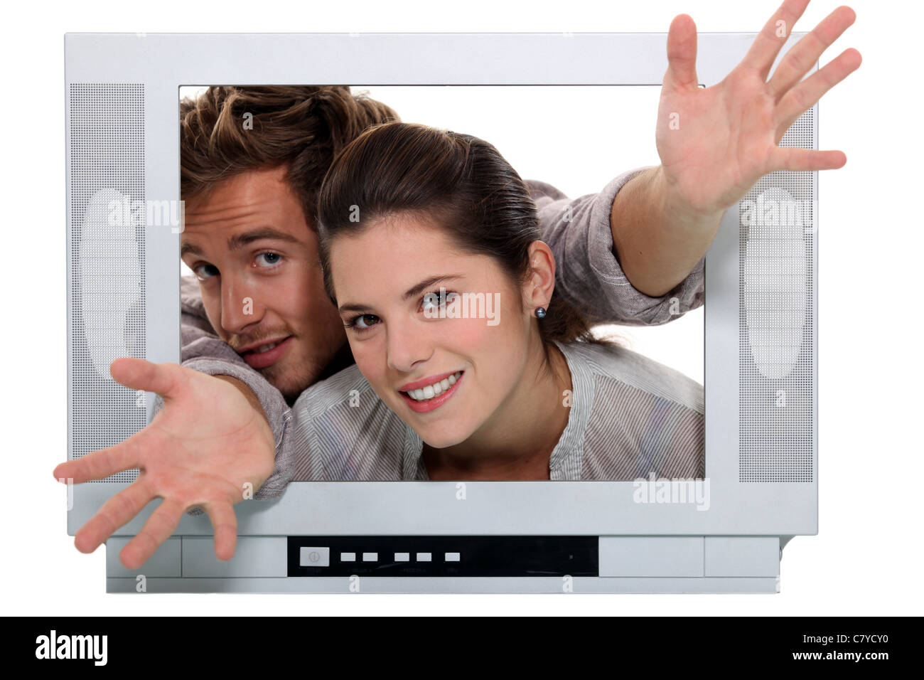 Couple popping out the TV Stock Photo Alamy