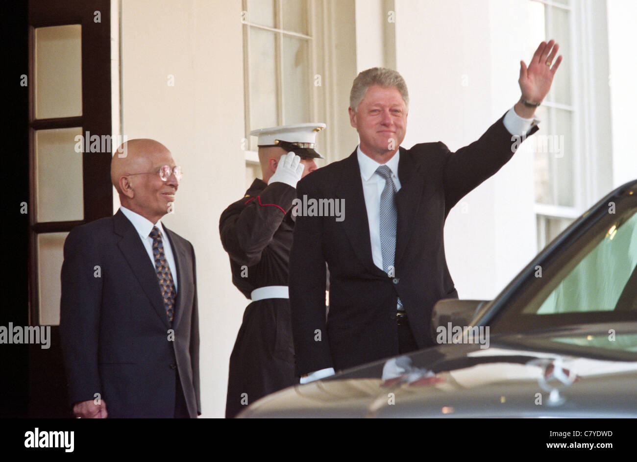 President Bill Clinton and King Hussein of Jordan wave to the media at the White House January 5, 1999 in Washington, DC Stock Photo
