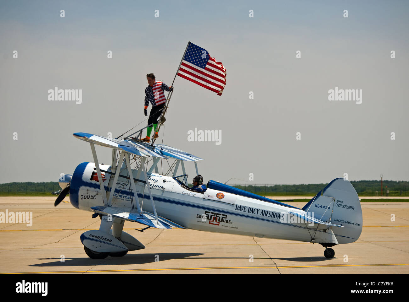 men actor stay on wing airplane American Flag Air Fest Stock Photo