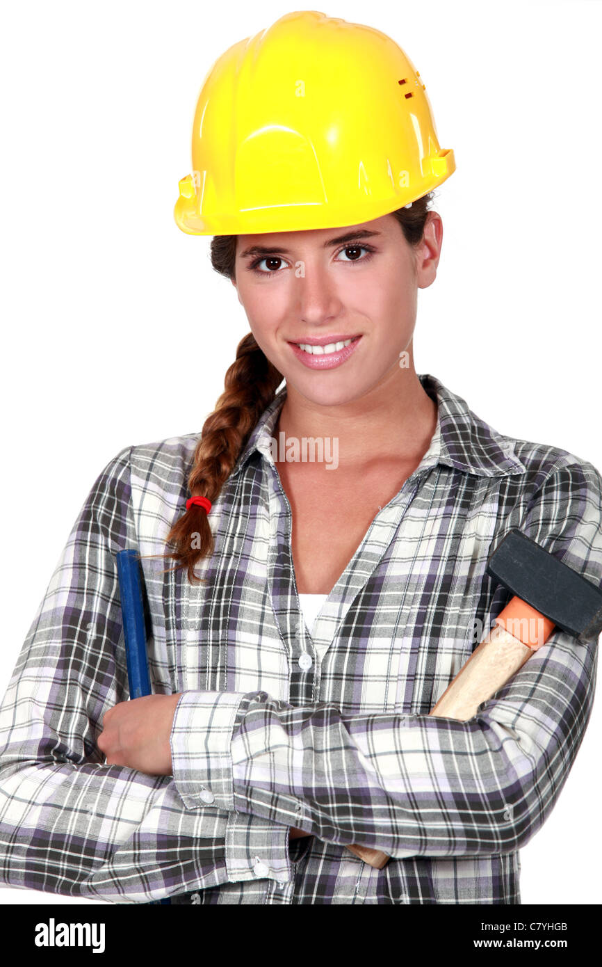 Woman with hammer and chisel Stock Photo