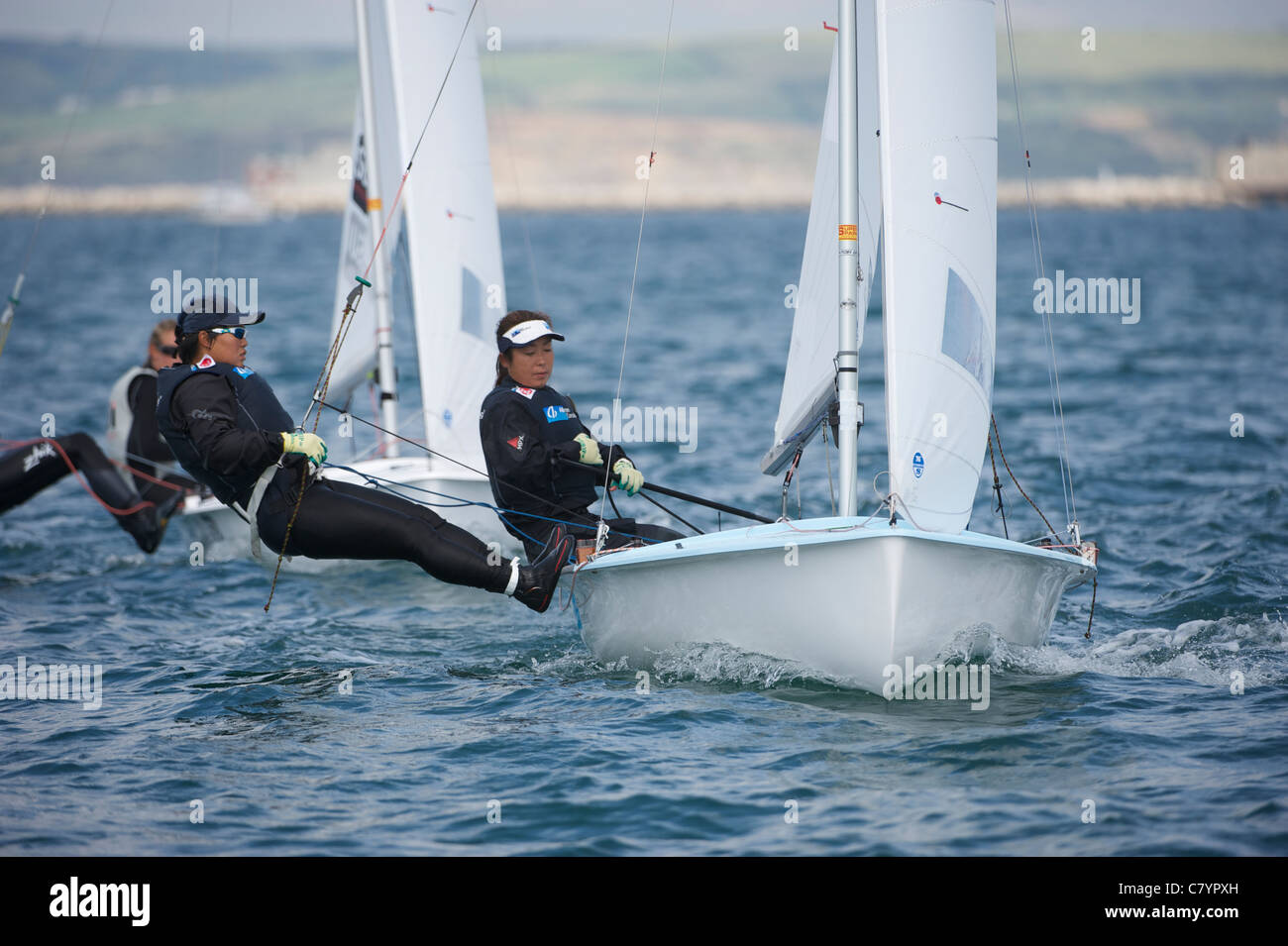 Vlada Ilienko and Elena Khryukina (RUS), 470, women's two person dinghy, Sailing Olympic Test Event, Weymouth, England Stock Photo