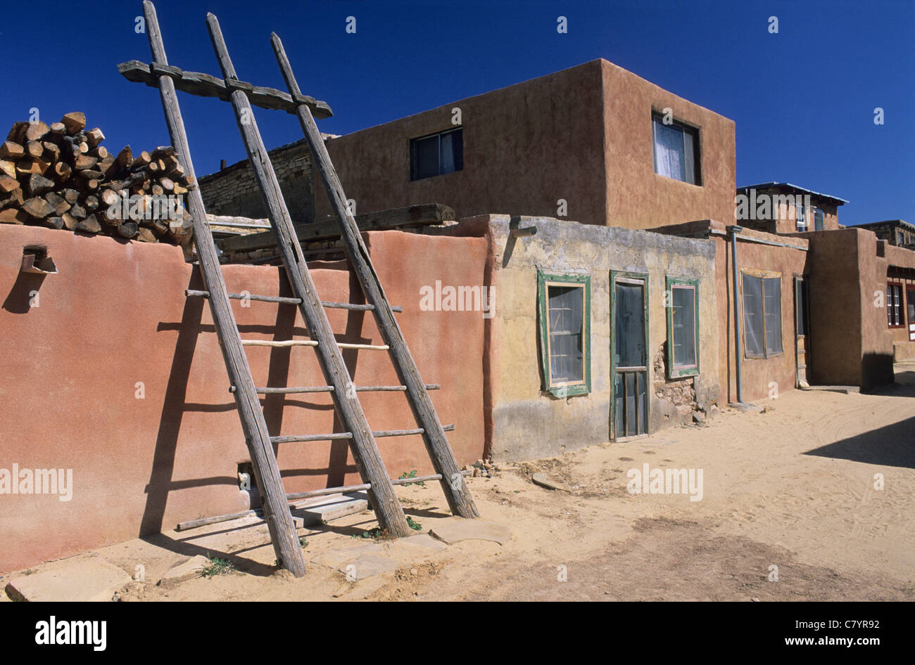 New Mexico, Acoma Indian Reservation, Acomo pueblo with ladders leading to roof tops Stock Photo