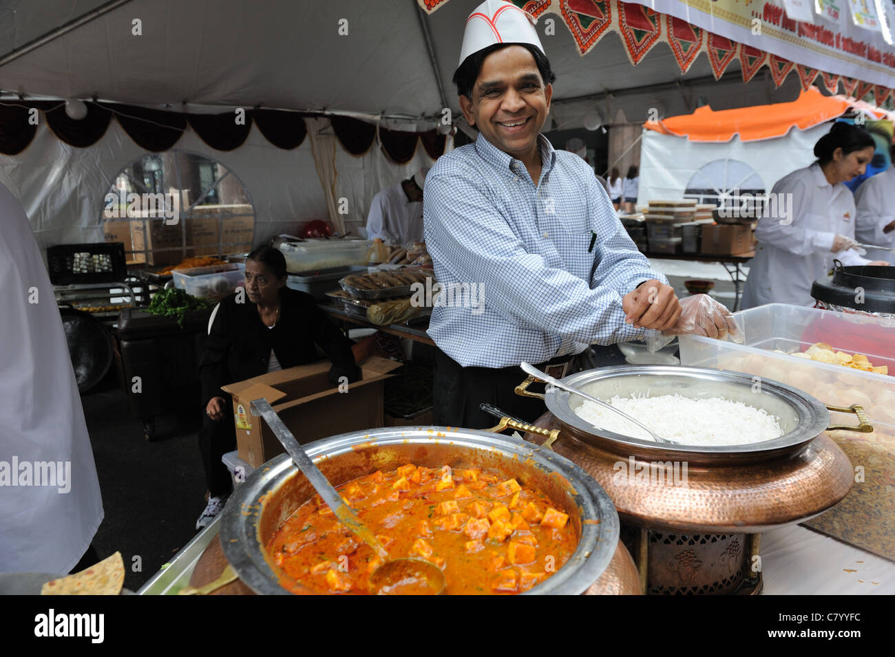 An Indian food vendor at a street fair in Lower Manhattan. Oct. 2, 2011 Stock Photo