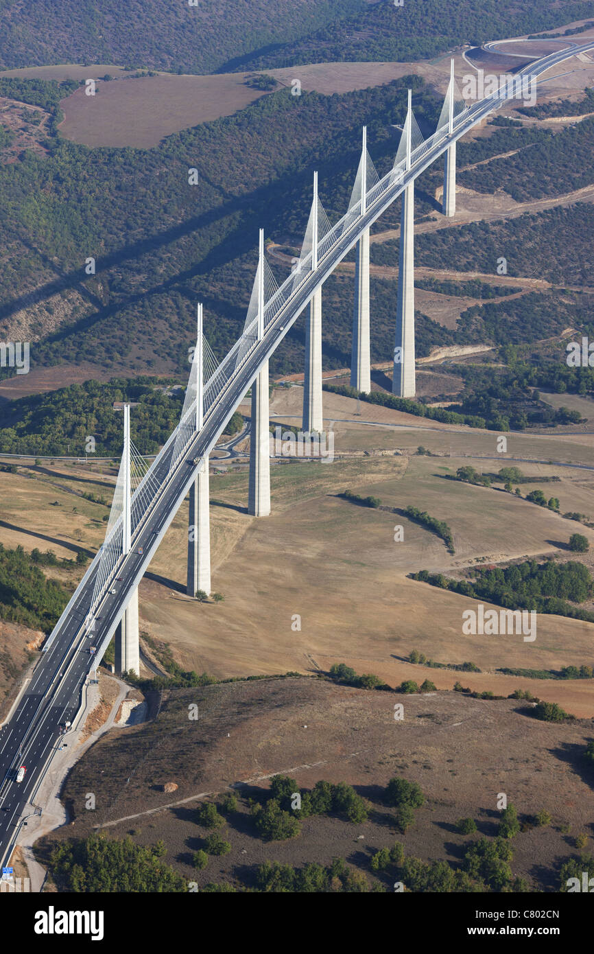 AERIAL VIEW. A75 highway on a multiple-span cable-stayed bridge spanning the Tarn Valley. Millau Viaduct, Creissels, Aveyron, Occitanie, France. Stock Photo