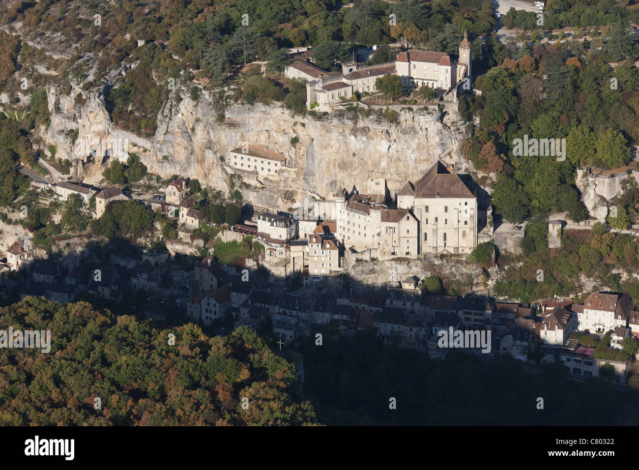 AERIAL VIEW. Rocamadour Castle on the clifftop and the Rocamadour Sanctuary at the foot. Lot, Quercy, Occitanie, France. Stock Photo