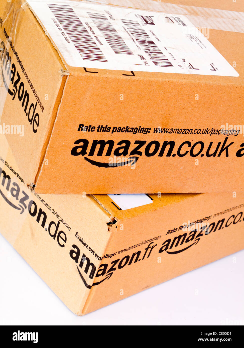 Cardboard boxes containing products sent from Amazon UK to a customer Stock Photo