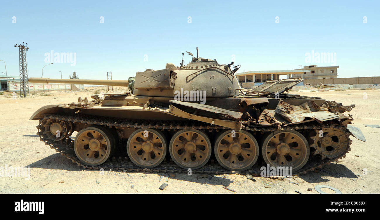 A T-55 tank destroyed by NATO forces in the desert north of Ajadabiya, Libya. Stock Photo