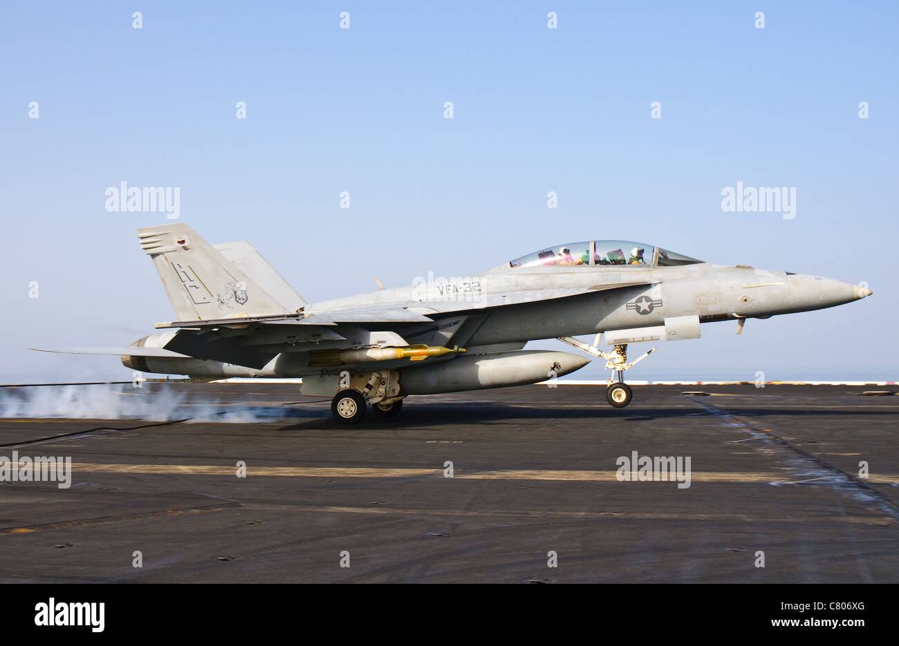 An F/A-18E Super Hornet lands aboard USS Harry S. Truman. Stock Photo