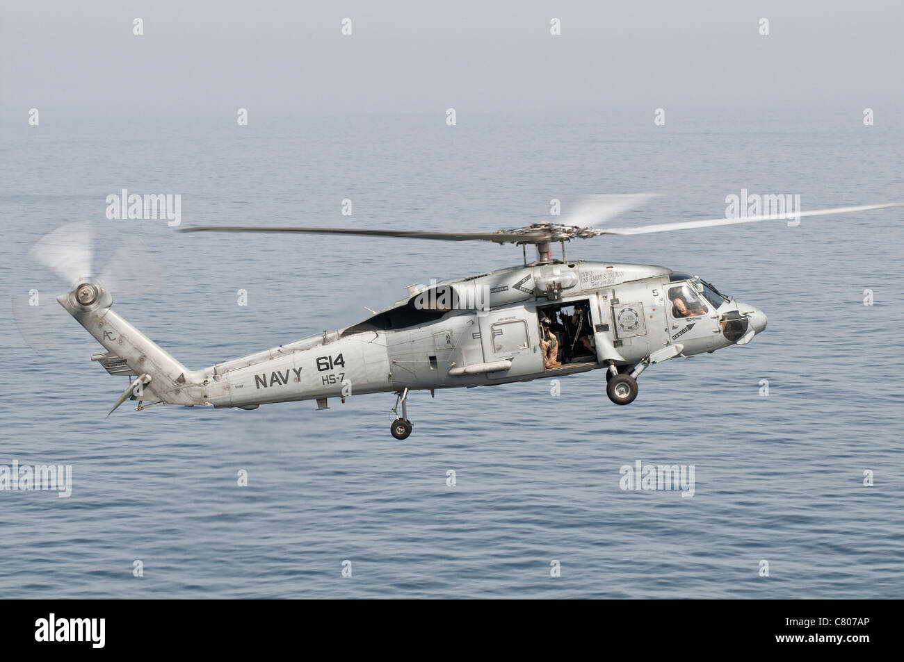 An SH-60F Seahawk gets airborne from the deck of USS Harry S. Truman. Stock Photo
